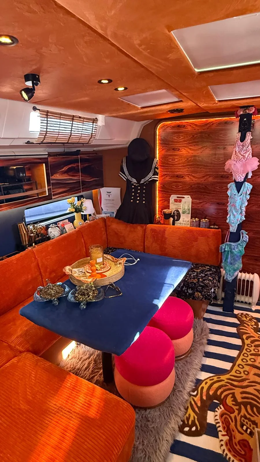 Orange and pink interior aboard the Capitana