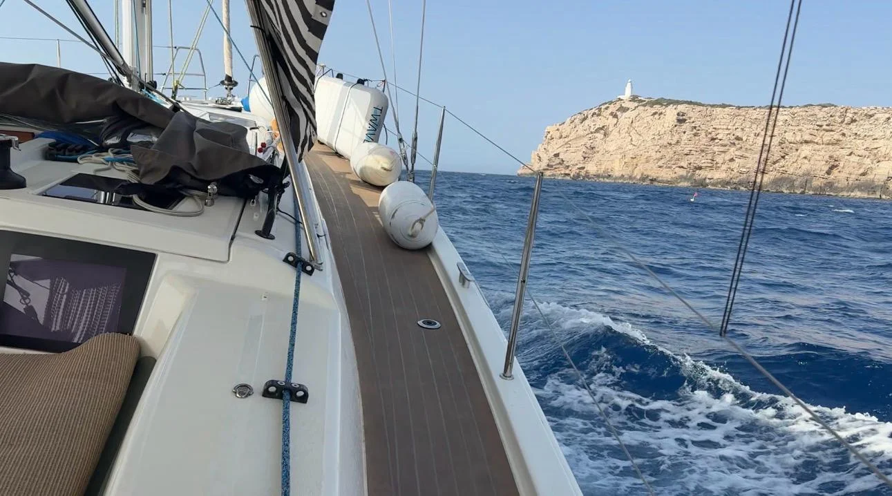 Sailing yacht at anchor on open water